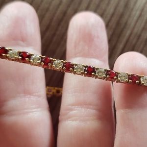 Red and white tennis bracelet